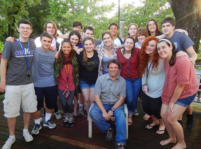 Chantilly Theater Director Ed Monk surrounded by this year’s graduating senior thespians.
