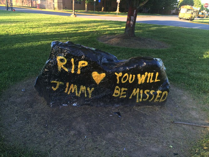 Herndon High Students paint the landmark rock in front of the high school in honor of Jimmy McLaughlin. McLaughlin was a strong presence in Herndon High athletics and the Herndon community. His mother, Kathy McLaughlin, is a Herndon High educator of Health and Physical Education as well as the Herndon High Swim Team Coach. 


