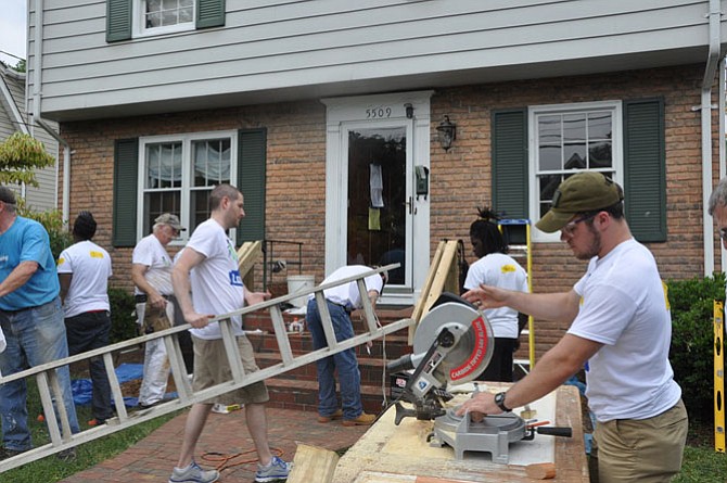 Rebuilding Together Arlington/Fairfax/Falls Church and Lowe’s Heroes employee volunteers complete renovations for Arlington homeowners on June 16. 
