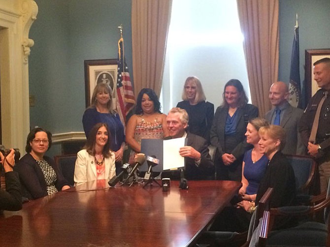 Governor Terry McAuliffe signing Delegate Eileen Filler-Corn's Bill, HB 659.

