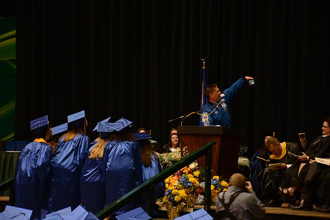 Robinson’s 2016 commencement speaker, 1991 graduate and NASA astronaut Kjell Lindgren (center) takes a selfie with class officers.