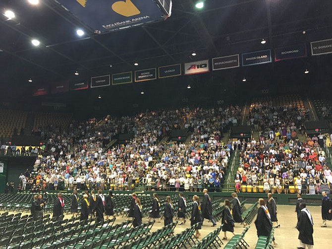 Teachers and faculty file in. Westfield High School held its graduation in the EagleBank Arena at George Mason University. 
