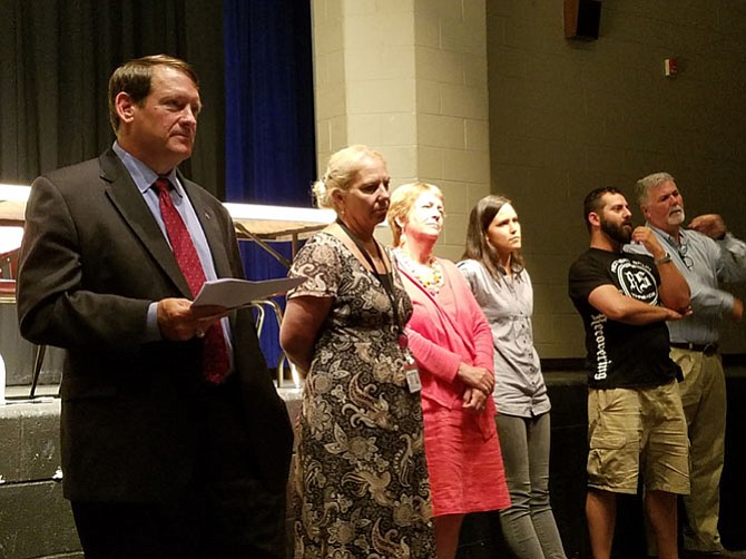 Springfield District Supervisor Pat Herrity leads the discussion at the county-wide Heroin and Prescription Drug Abuse Town Hall in Centreville High School on June 14.
