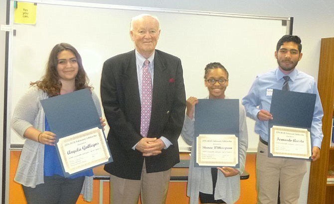 At the June 6 ceremony to announce United Community Ministries’ 2016 Lois Valencourt Scholarship Fund awardees are: (from left) Angela Gallegos (Bryant Alternative High School), Harry Wood, executor for Ms. Valencourt’s estate, Shanae Witherspoon (Bryant Alternative High School), and Fernando Acosta (West Potomac High School).  Not pictured: Tenesha Green (Bryant Alternative High School).
