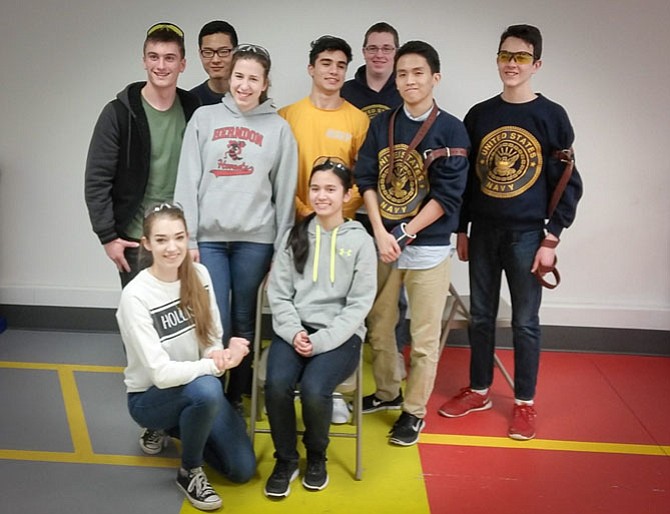 Rifle Team members celebrate competing in the Area 5 Championship, and thank the Izaak Walton League for inviting them to shoot the match at its new facility.  