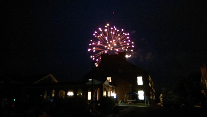 Despite a somewhat cloudy sky, fireworks at the Workhouse Arts Center went off as planned, beginning around 9:10 p.m. with the singing of “The Star-Spangled Banner.”