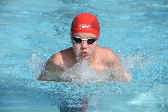 Charlie Longnecker of the Donaldson Run Thunderbolts swimming boys' 9-10 breaststroke.
