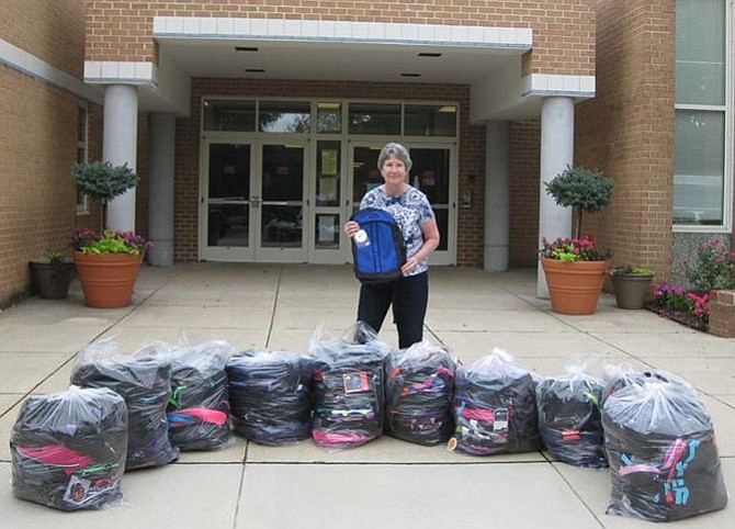 Pam Fruit delivered 150 backpacks from Centreville Baptist Church to London Towne Elementary in a previous year.
