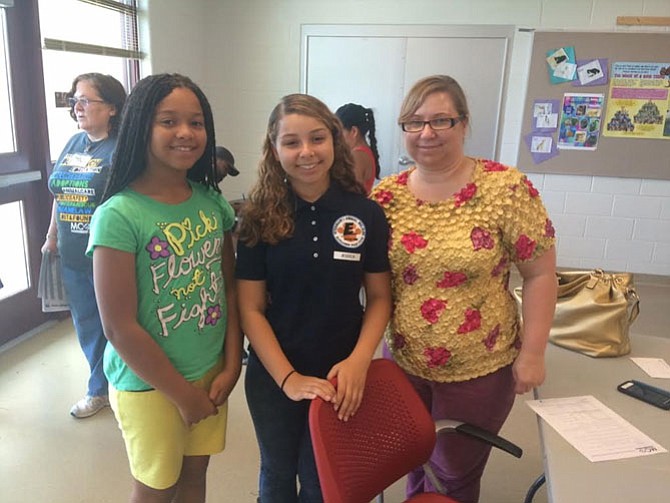 Vanessa Miller (left), Hollie Miller (right), and Jessica Mendez, (center, President of the MCPAW Explorer's Post 7315) are hoping for a dog! 
