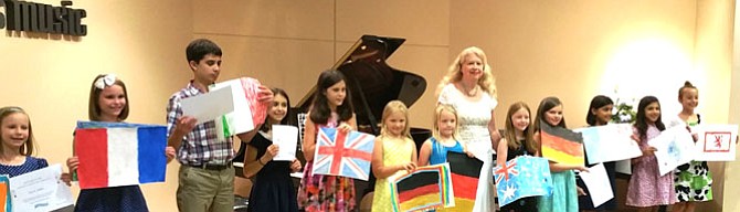 Each student created a country's flag to display while they were playing music from that country.  