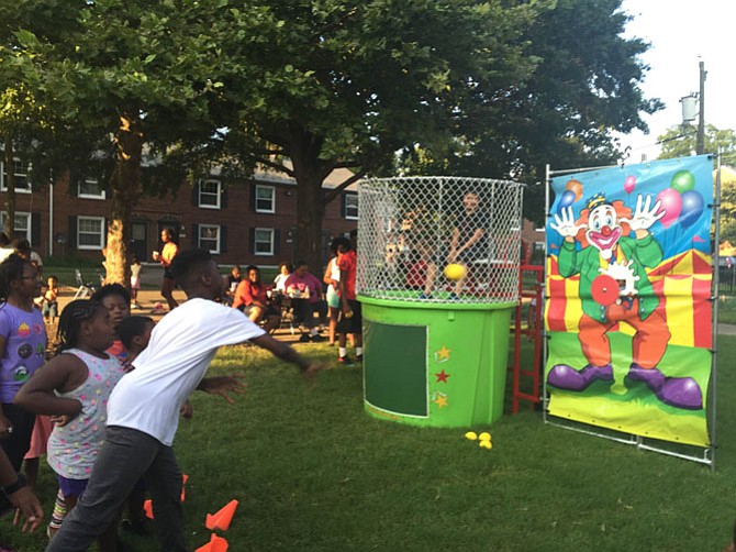 A dunk tank set up at the Tancil Court location for National Night Out.
