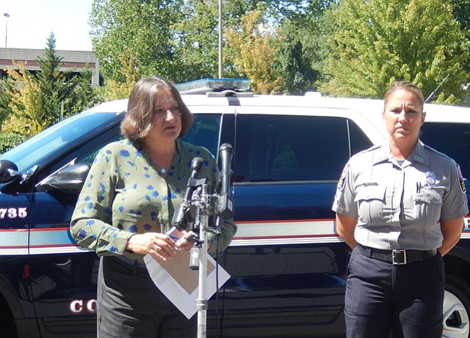 Judy Pedersen (left) and Monica Meeks at a press briefing, Sunday afternoon, outside police headquarters in Fairfax.
