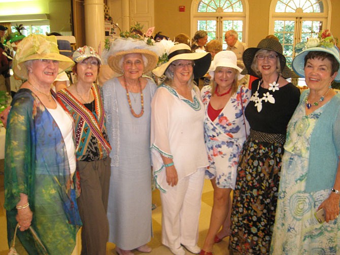 Enjoying the Garden Party at Historic Pohick Church in Lorton are from left: Judy Sunderland, Sandi Kind, Jackie Wells, Gloria Jackson, Pamela Nelson, Jane Grant, and Charlotte Knipling. 
