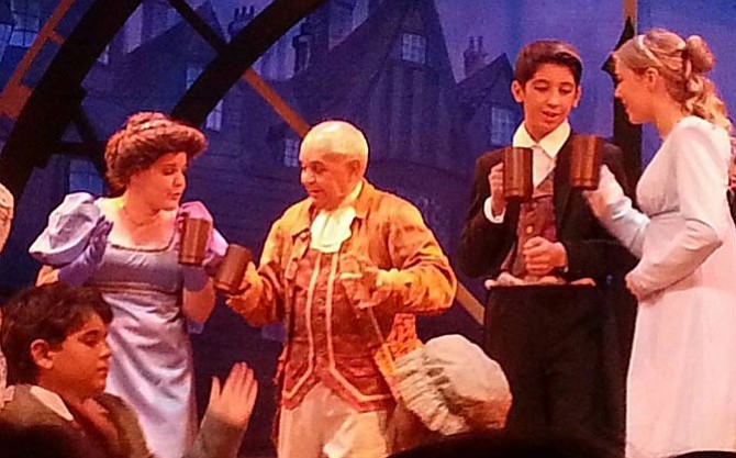 Roland Branford Gomez, center, as Fezziwig in last year’s LTA production of A Christmas Carol.
