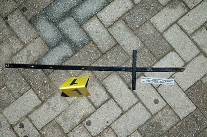 Police later released a photo of the apparent weapon, which turned out to be a metal signpost with a sharp end used for driving into the ground.