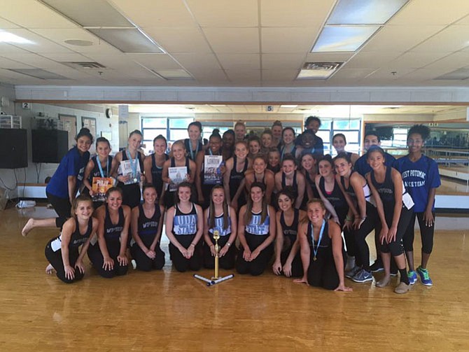 West Potomac High School Dance Team poses with UDA clinicians/judges and awards on final day of three day evaluation/competition qualifier camp.
