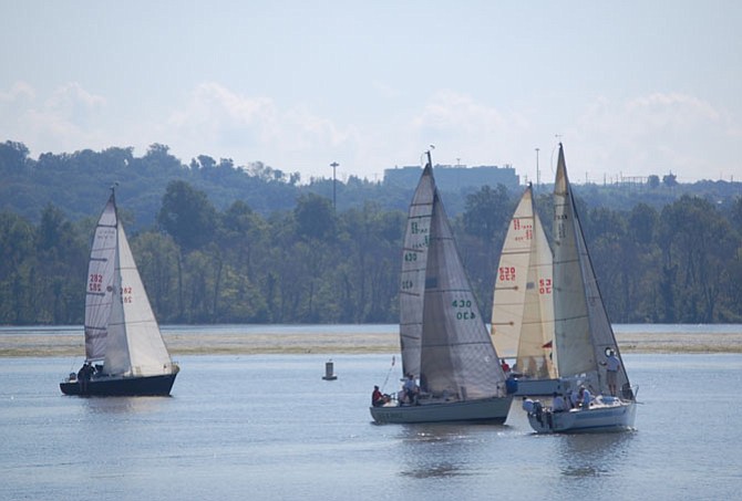 The start of the first international race, with the boats tacking upwind toward the Wilson Bridge.
