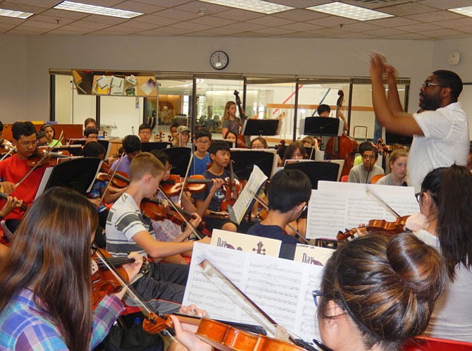 Rocky Run Middle Orchestra Director Stephen Matthie conducts the highest-level orchestra at the camp.

