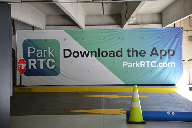 The signage for the new pay-to-park system at Reston Town Center. Many residents oppose the change.

