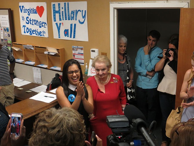 Campaign staffer Natalie Caraballo (left) introduces Madeleine Albright. “I am from Puerto Rico and took a flight to Alexandria to come make sure others vote,” said Caraballo. “As a double minority, a Latina woman, I need to be well represented in this election. That’s what brought me here.”