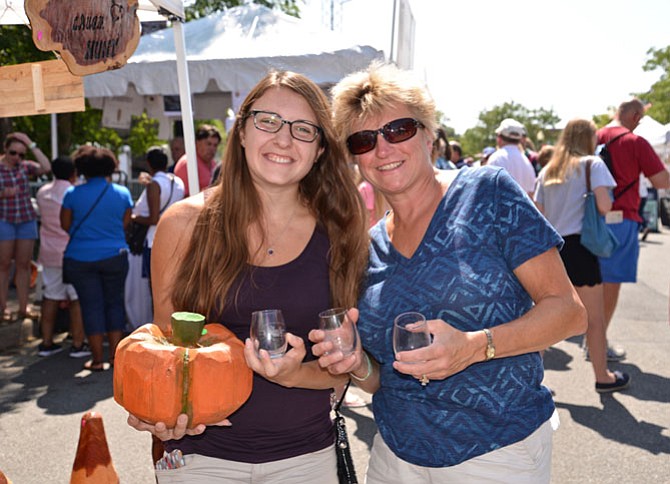 From left -- Meredith and Karen Wood. Mom Karen is visiting from Michigan. “What a great way to spend the holiday! And look at this gorgeous carved pumpkin. Meredith just had to have it!”