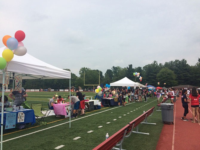 Club booths lined the edge of the football field at McLean High School at Celebrate McLean on Thursday, Sept. 1.