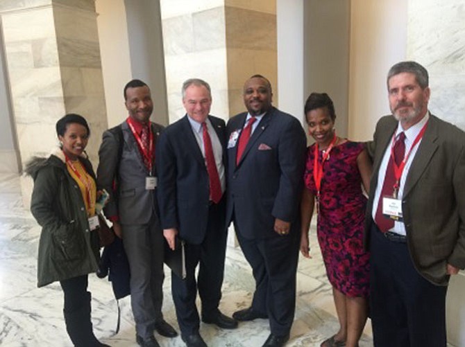 Team members from Inova Health System’s Juniper Program, the largest HIV/AIDS care provider in Northern Virginia, meeting with U.S. Senator Tim Kaine (D-VA) at AIDS Watch 2016. 