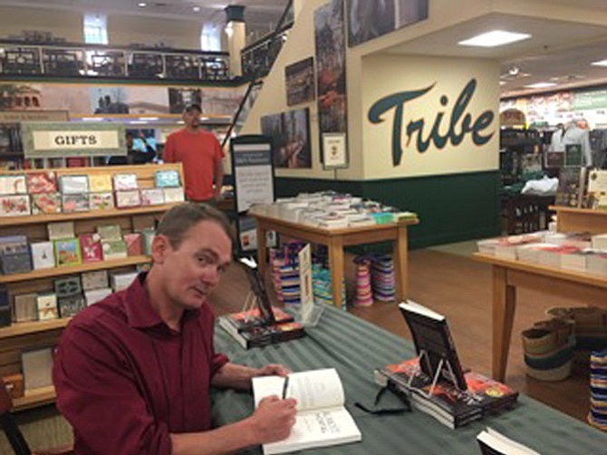 Christopher Leibig at a book signing for his novel, “Almost Mortal.”
