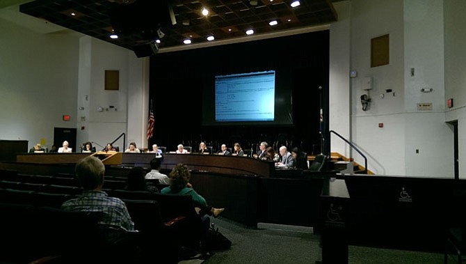 From their newly made over dais (dark wooden paneling replaced the older light-colored seating area for board members, while a new ADA-compliant viewing area for individuals with handicaps was also added over the summer), they ultimately decided to postpone taking action on new financial contribution and sponsorship policy until Dec. 1.