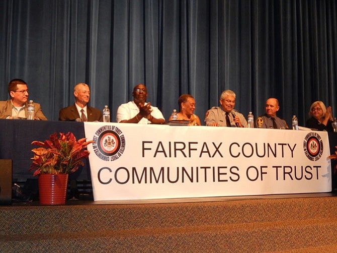 Panel members (from left) are Jorge Figueredo, Special Agent Keith Palli, the Rev. Milton Harding, Shirley Ginwright, Maj. Rich Perez, Lt. J-P. Koushel and Claire Gastañaga. 

