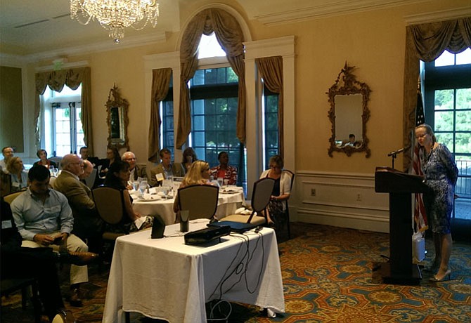 Right, Mount Vernon District FCPS school board member Karen Corbett Sanders speaks to members of the Mount Vernon-Lee Chamber of Commerce on Sept. 8.