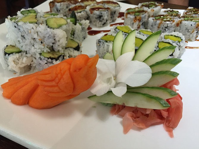 May Island offers an abundance of sushi selections, complete with artistic adornments to each platter.
