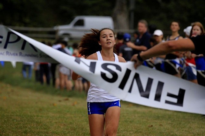 Anna Prater wins Oatlands Invitational JV Upperclassmen girls division race.

