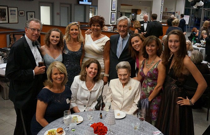 Mayor Allison Silberberg is seated between The Twig president  Elizabeth Sullivan and past president Jean Vos at the Sept. 23 Diamond Jubilee Party celebrating the 75th anniversary of The Historic Alexandria Homes Tour. Joining them in back are John Kling, Erin Murphy, Elizabeth Wilmot, Terry Fuller, Gregg Murphy, Shannon Murphy, Monica Murphy and Ana Karina Murphy.

