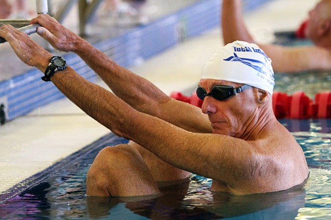 Herb Levitan from Arlington gets ready to compete in the 100 yard backstroke for the 75-79 age group on Sept. 16 at the Claude Moore Recreation Center in Sterling.  He came in first  place.  
