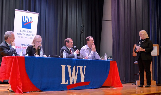 From left: The Meals Tax forum panellists were management consultant Phil Niedzielski-Eichner and School Board member Pat Hynes representing the proponents, and Supervisor Pat Herrity (R-Springfield) and Great American Restaurants CEO Jon Norton, opposing the proposal. Mary Kimm, editor and publisher of the Connection Newspapers, was the moderator.