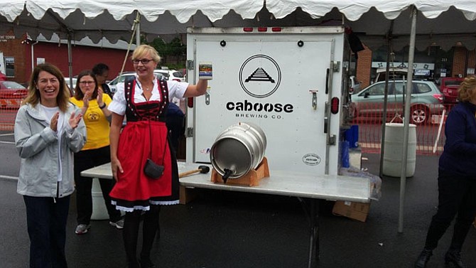 2016 Vienna Oktoberfest Burgermeister Friderike Butler kicks off Vienna's annual Oktoberfest celebration by officially tapping the beer keg.
