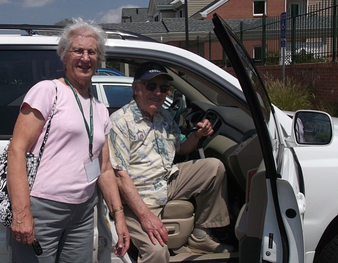 Left, Verdell Wiles of Fairfax gives a medical transportation ride to Cleveland Hudgins of Fairfax (right), a service from the non-profit Shepherd’s Center of Fairfax-Burke.
