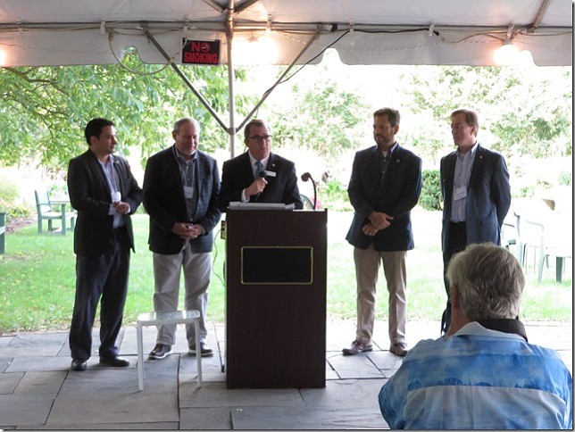 Center, state Sen. Adam Ebbin (D-30) speaks at the Oct. 2 Friends of Dyke Marsh 40th anniversary celebration. Rear, from left, are Del. Mark Levine (D-45), Del. Mark Sickles (D-43), state Sen. Scott Surovell (D-36) and Del. Paul Krizek (D-44).