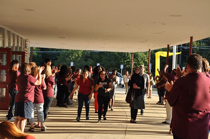 Students cheer at convocation on the first day of class.
