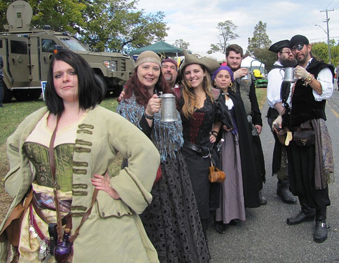 Pirates for Sail raise their tankards in a toast to Centreville Day.
