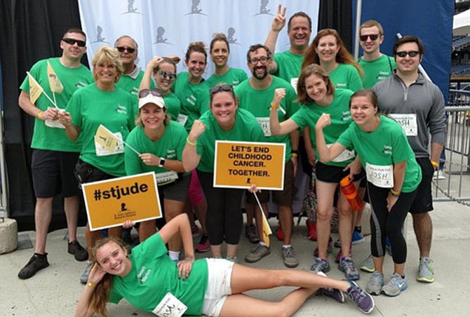 Days before Joshua Owusu died, Stratford Landing Elementary School staff members and their families participated in the St. Jude’s Walk/Run to End Childhood Cancer. They raised money in his name.