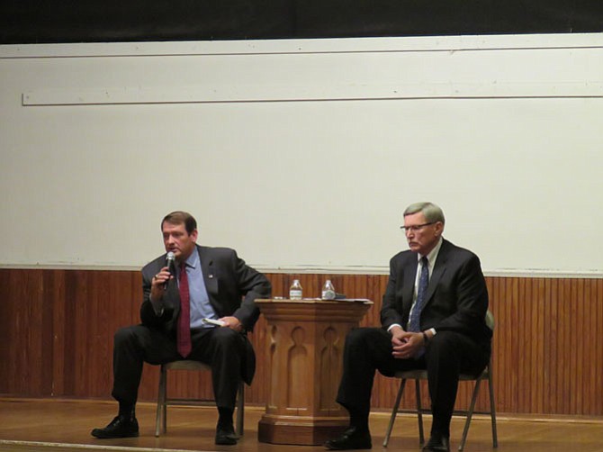 Supervisors Pat Herrity (R-Springfield) and John Foust (D-Dranesville) debate meals tax at the Great Falls Citizens Association meeting on Oct. 11.
