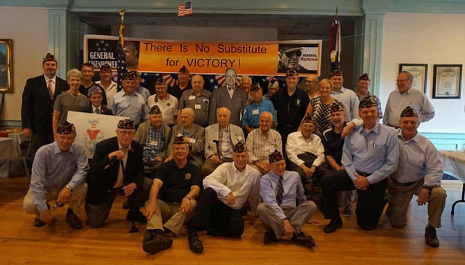 Members of American Legion Post 24, shown commemorating V-J Day with World War II veterans earlier this year, will be honored for their service to the community.
