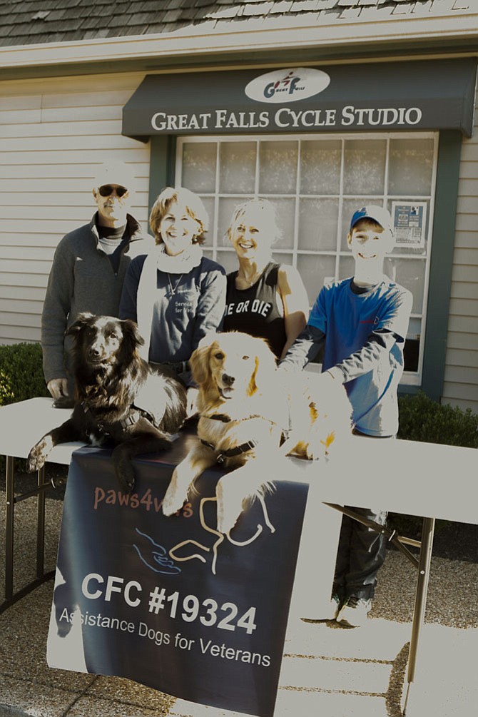 Miami Phillips, Shelly Phillips, Jenn Marstran, Dylan Kurtz with Goose and Shiloh at the paws4people fundraiser last Saturday at the Great Falls Cycle Studio.
