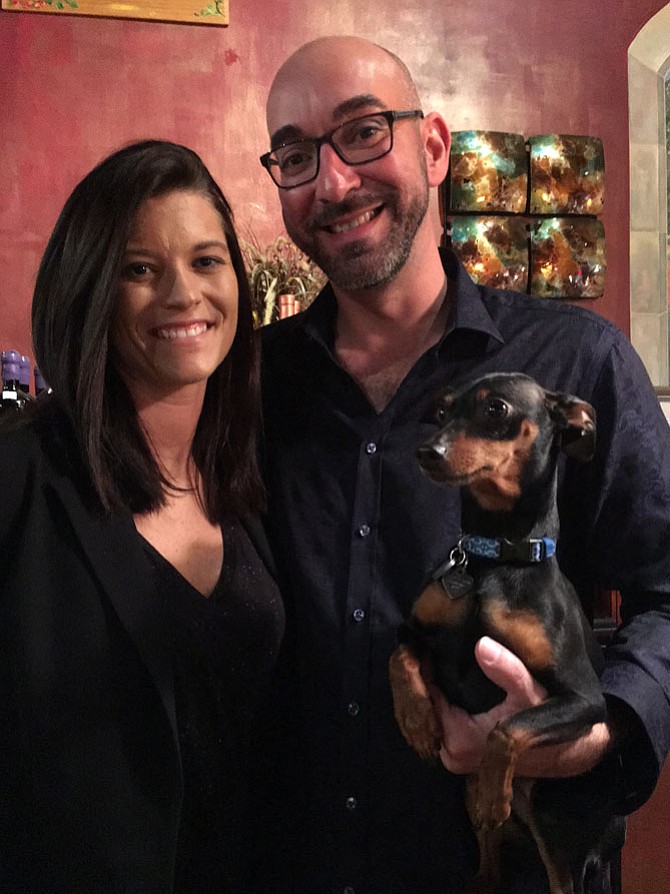 Vienna Vintner owner and event sponsor Victor Mendes with co-founder of Wolf Trap Animal Rescue, Dr. Amber Burton, and Vienna Vintner rescue-mascot Ruff, at Thursday’s FUNdraiser on behalf of WTAR.
 

