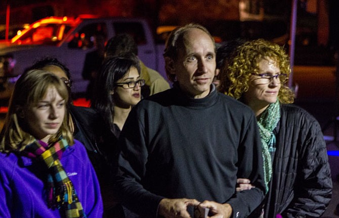 A family prepares for the haunted house. 
