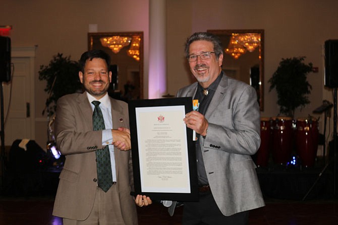 State Sen. Scott Surovell (D-36) with the Rev. Dr. Keary Kincannon and the General Assembly resolution recognizing Rising Hope Church.