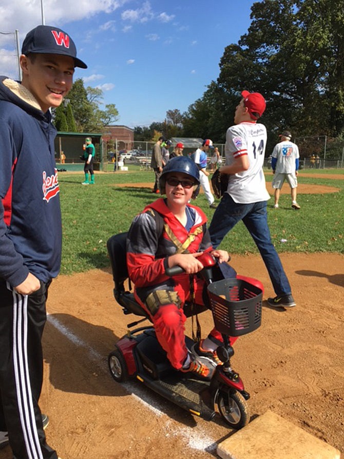 Around 125 players, siblings and player buddies in costume participated in two baseball games as part of the Fairfax Challenger League’s Trunk-r-Treat event at Chilcot Field in Fairfax.