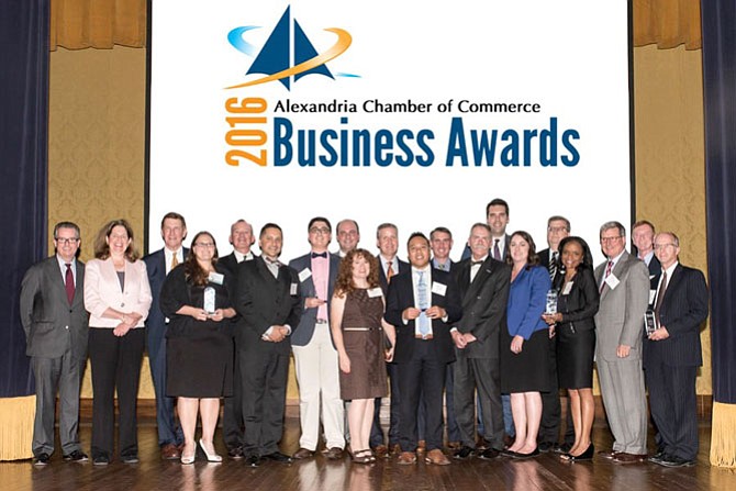 Chamber of Commerce board chair Robert Shea, Mayor Allison Silberberg and U.S. Rep. Don Beyer, at left, gather with winners of the 2016 Chamber of Commerce Business of the Year awards Oct. 19 at the George Washington Masonic National Memorial.
